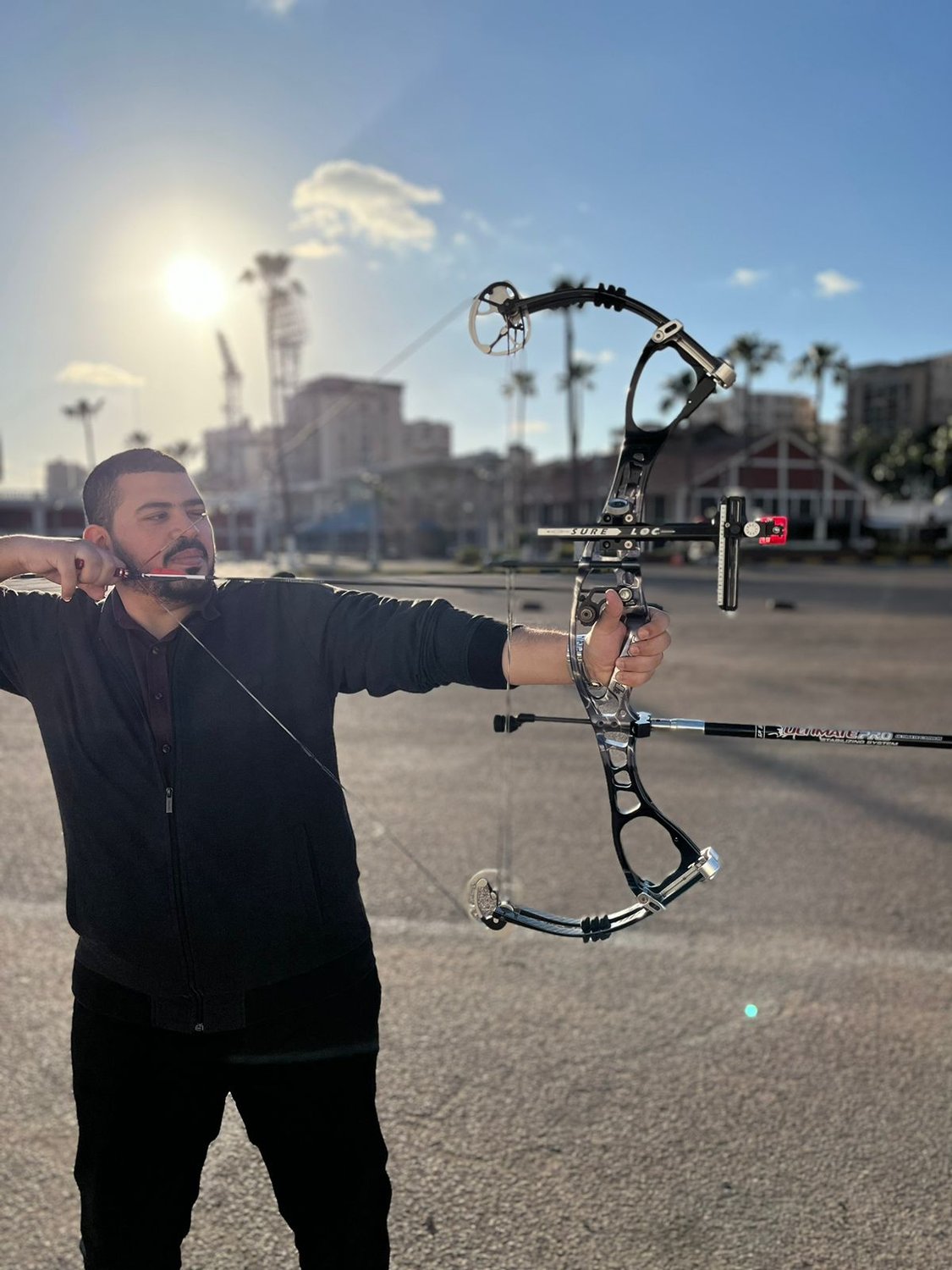 Moustafa Sharaf practicing archery