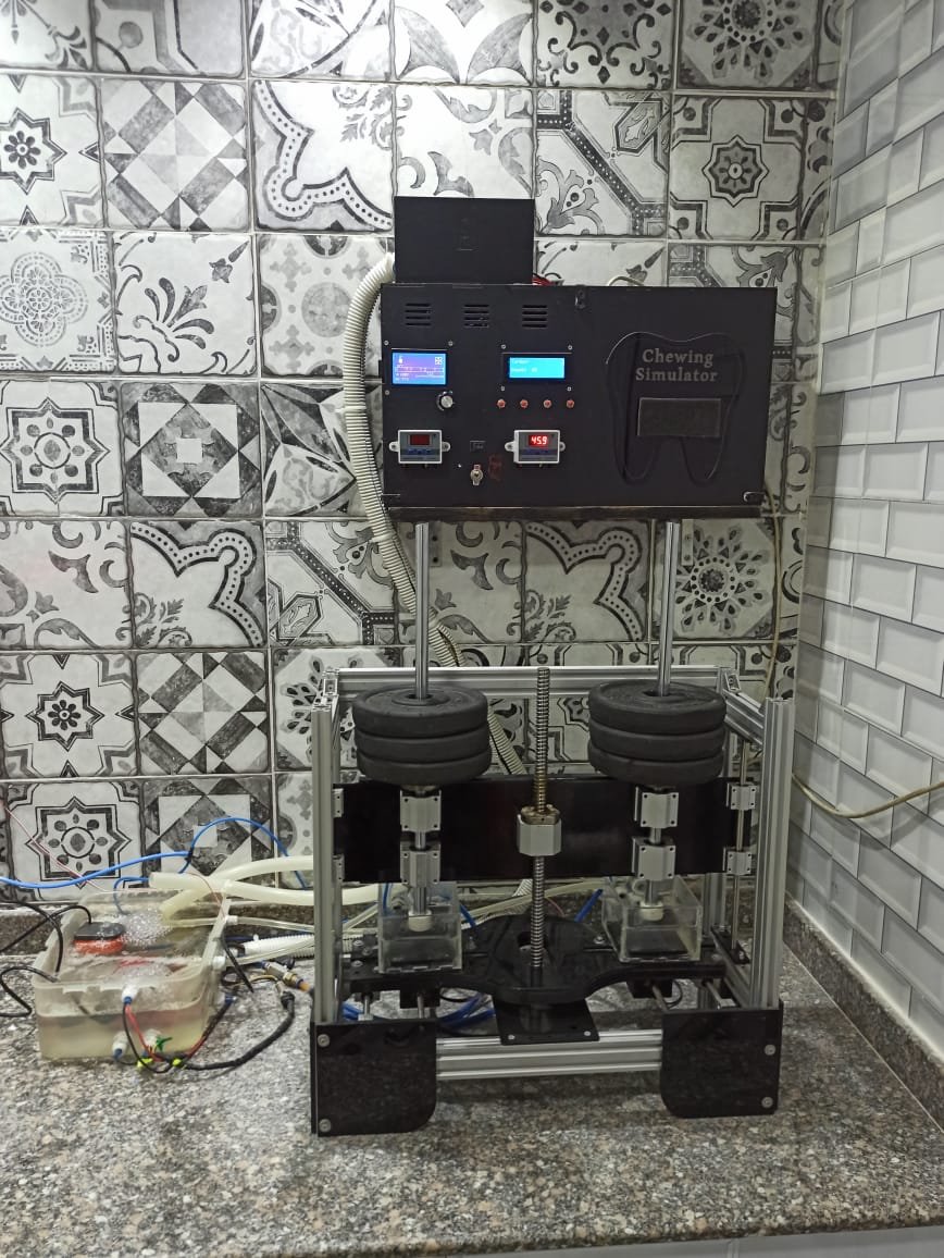 Chewing simulation test rig